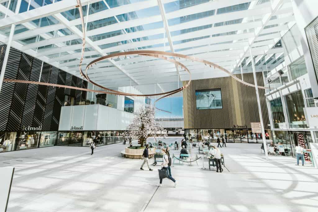 people sitting on chairs inside building