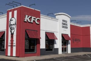 KFC Fried Chicken restaurant. Kentucky Fried Chicken is offering Uber and Door Dash delivery and drive thru service.