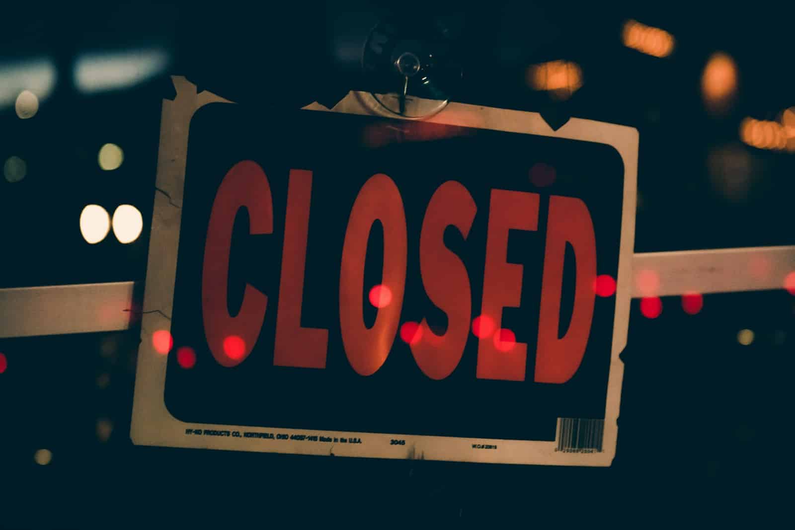 red and black closed sign